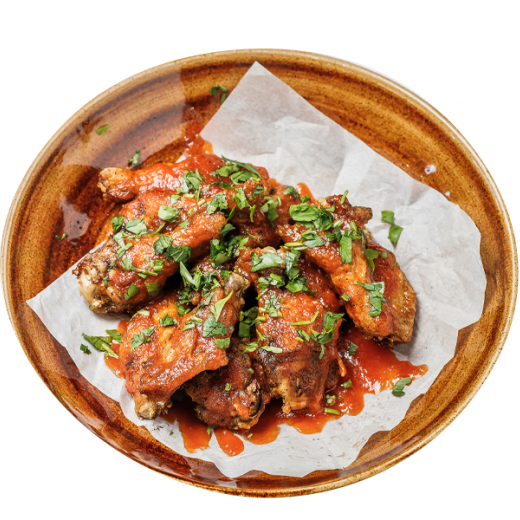 Курячі крильця у томатному соусі